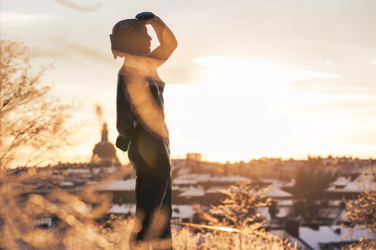 Parks in Stockholm. A statue in Vanadislunden. Behind it, a scenic view of Vasastan and Östermalm.